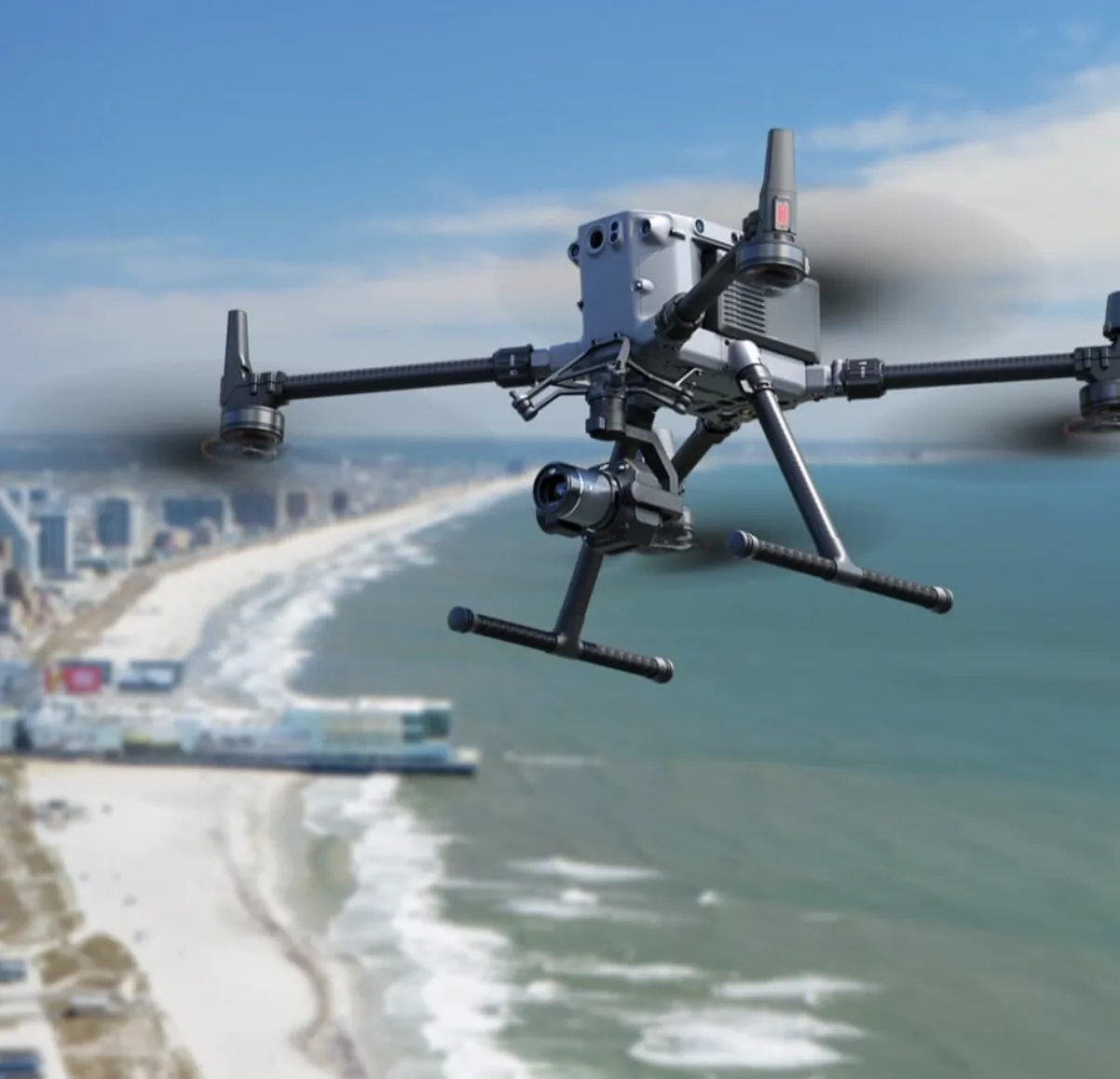 DJI Matrice commercial inspection drone in flight over coastal area