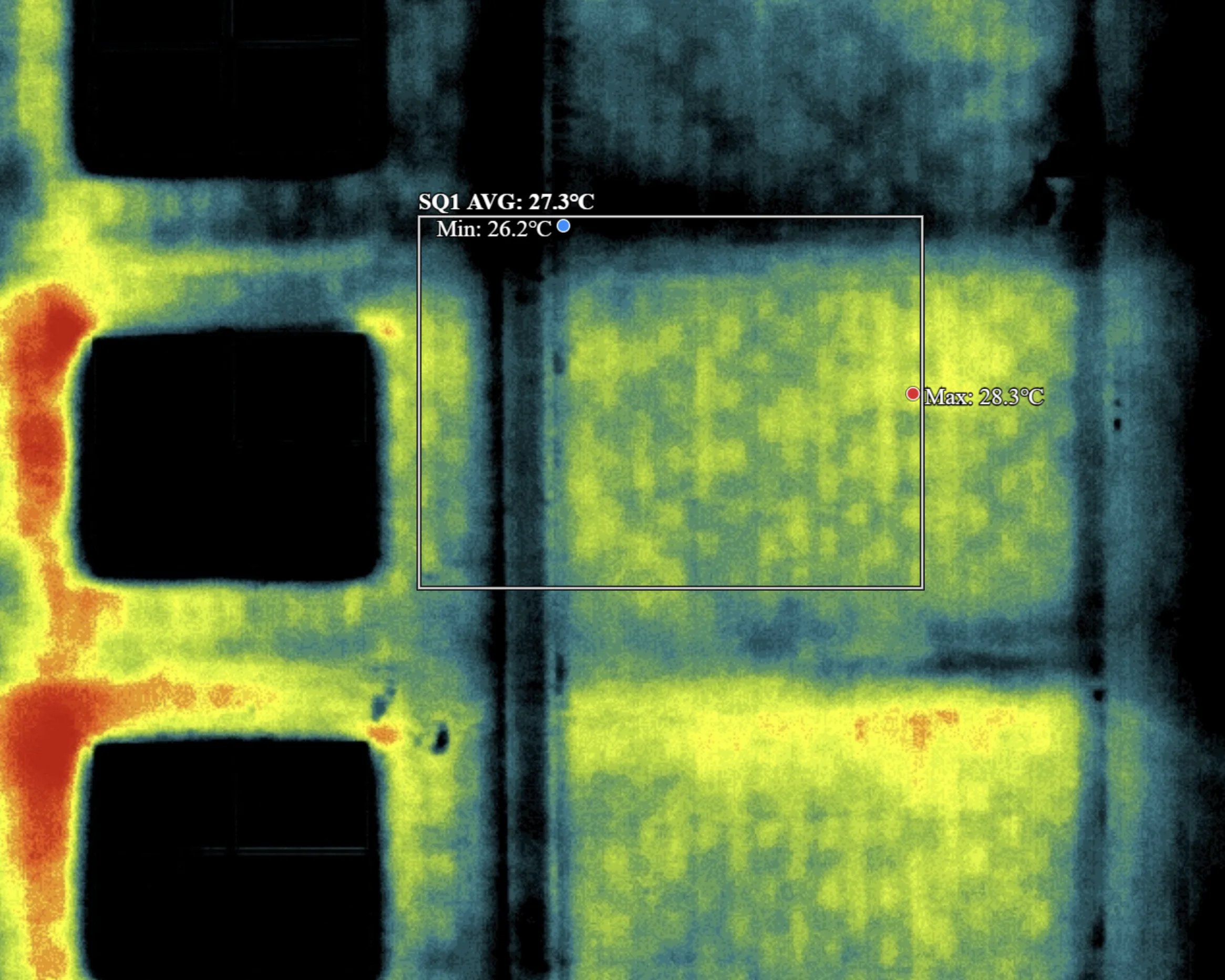 Close-up thermal infrared scan of building facade with temperature overlay data